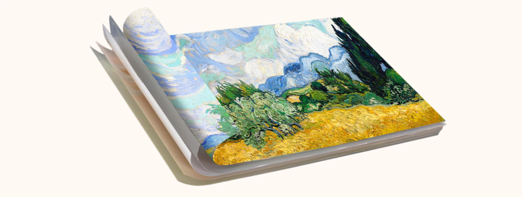 image | TCL Kenya Open art book with curling pages displaying a vibrant landscape painting featuring a golden field and blue sky.